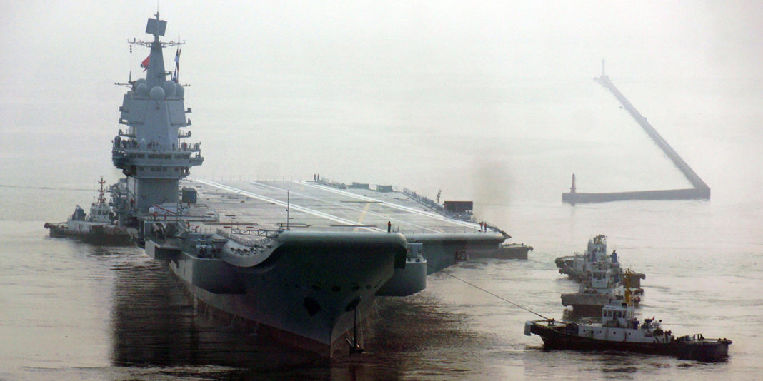 China's First Home-built Aircraft Carrier Sets Out For Sea Trial