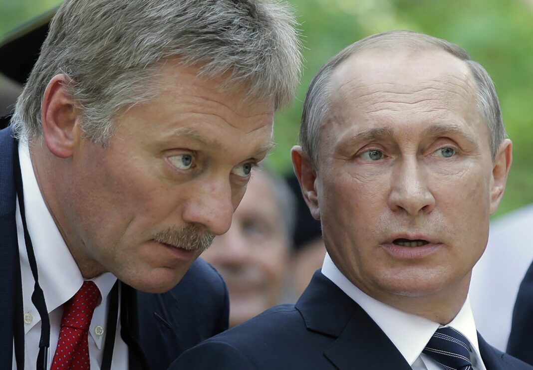 Dmitry Peskov and Vladimir Putin
