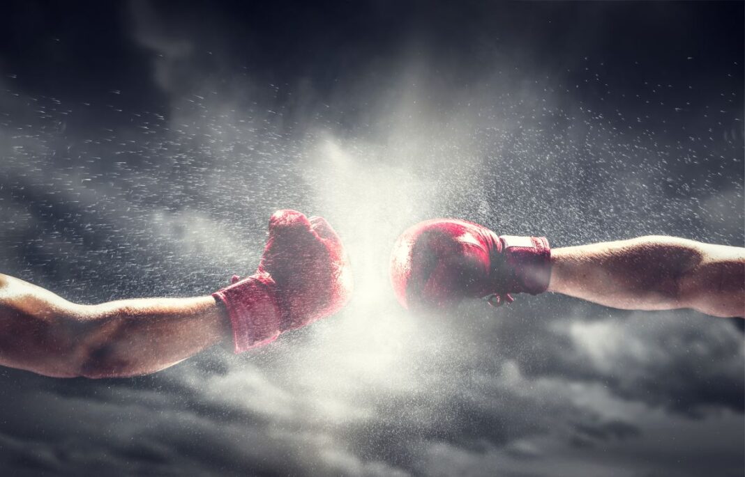 Two,Boxing,Gloves,Punch.,Light,On,Cloudy,Sky.,Box,,Power,