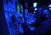 Passive-sonar operators wearing headphones strain to hear faint traces of an enemy submarine. The crew of the hunted sub go quiet, holding their breath, as active sonar pings against the hull, searching, searching, searching….