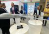 Iran has made a rare appearance at a Middle East defense show with an extensive stand in Qatar, showing an array of arms, full-sized naval weapons and models of unmanned aerial vehicles, including one named “Gaza.”