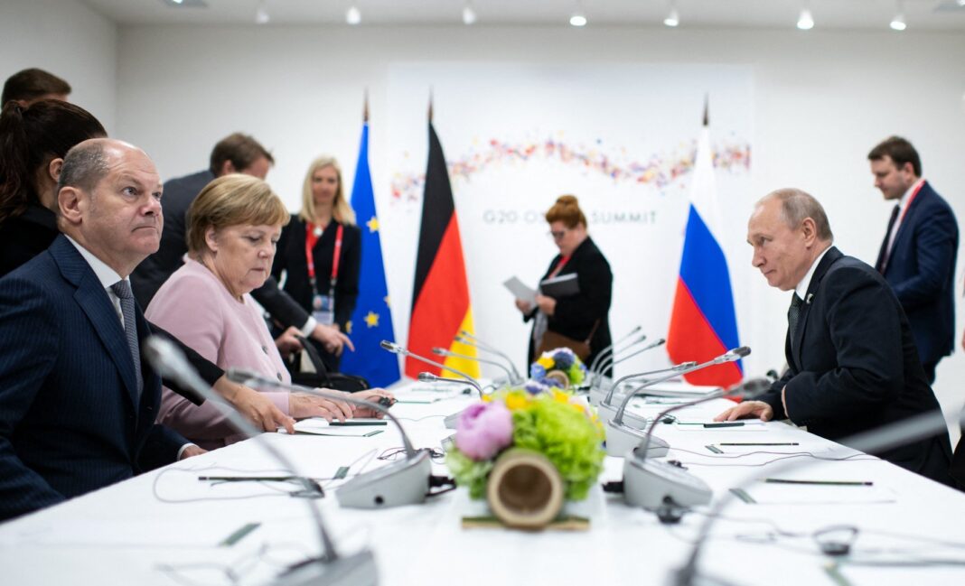 image-2024-04-23-27079149-0-olaf-scholz-intalnire-putin-din-2019-cand-actualul-cancelar-german-era-ministrul-finantelor-guvernul-angelei-merkel