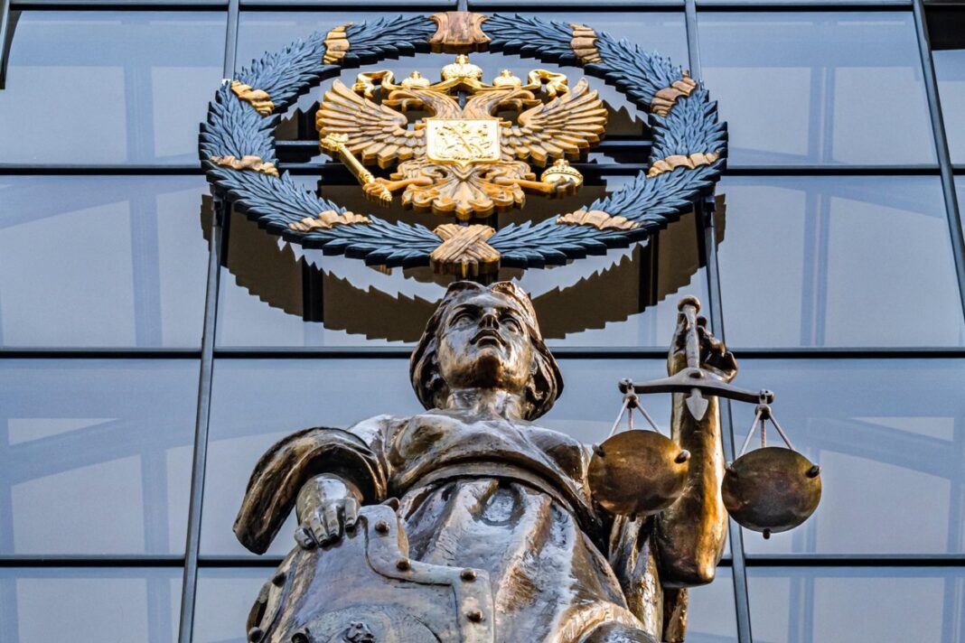 Russia, Moscow. A statue of Themis outside the Russian Supreme Court.